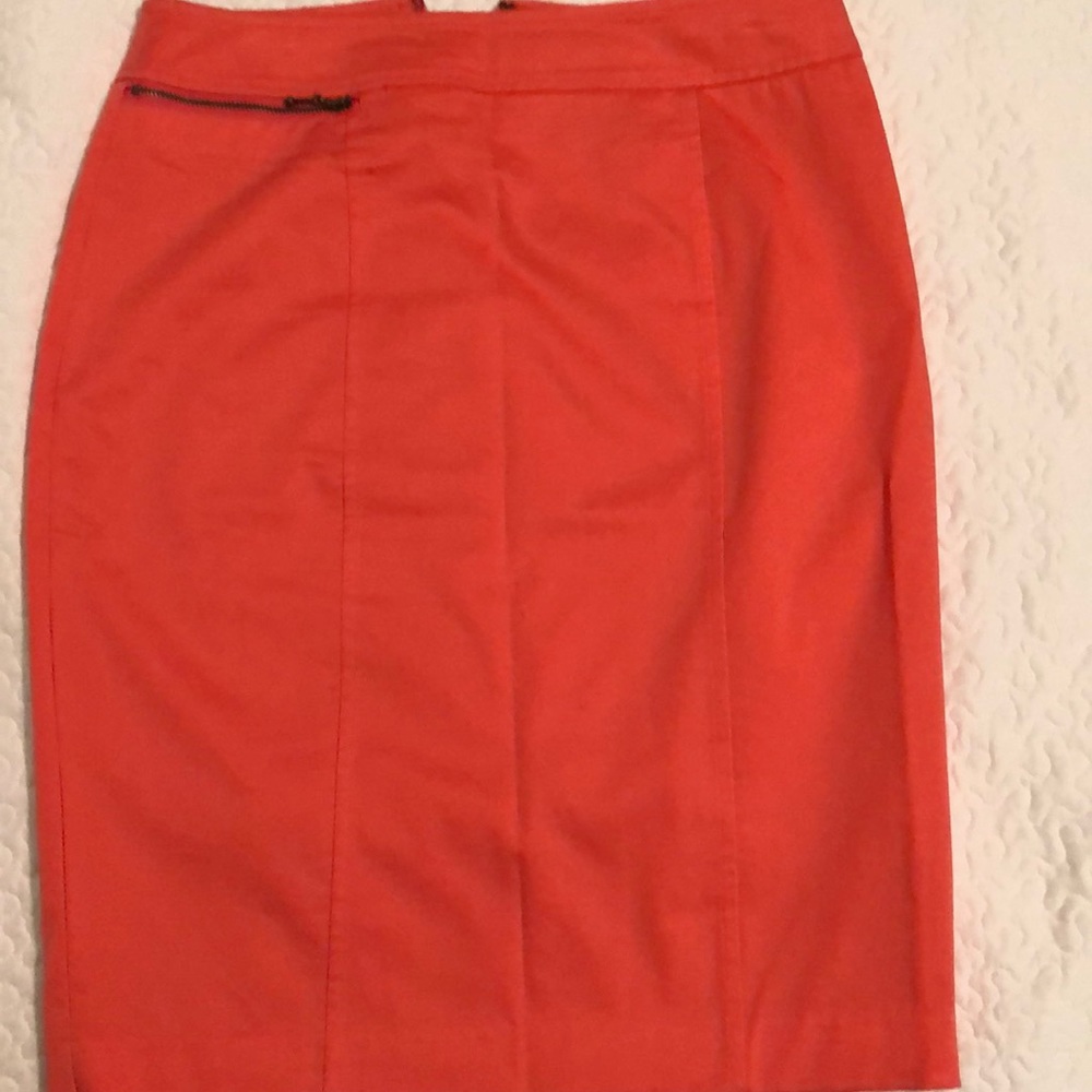 Orange colored skirt